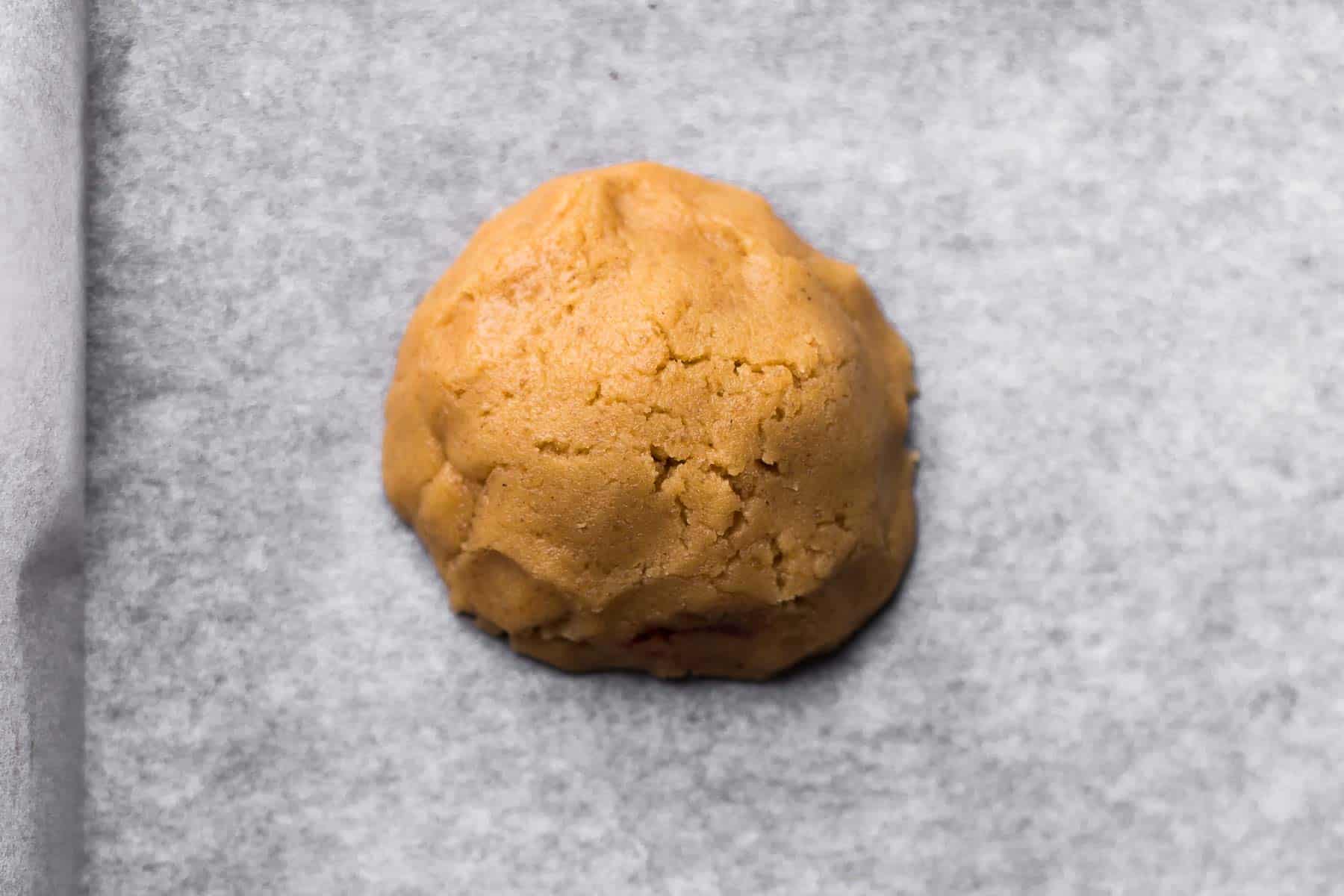 Peanut butter cookie dough on baking sheet