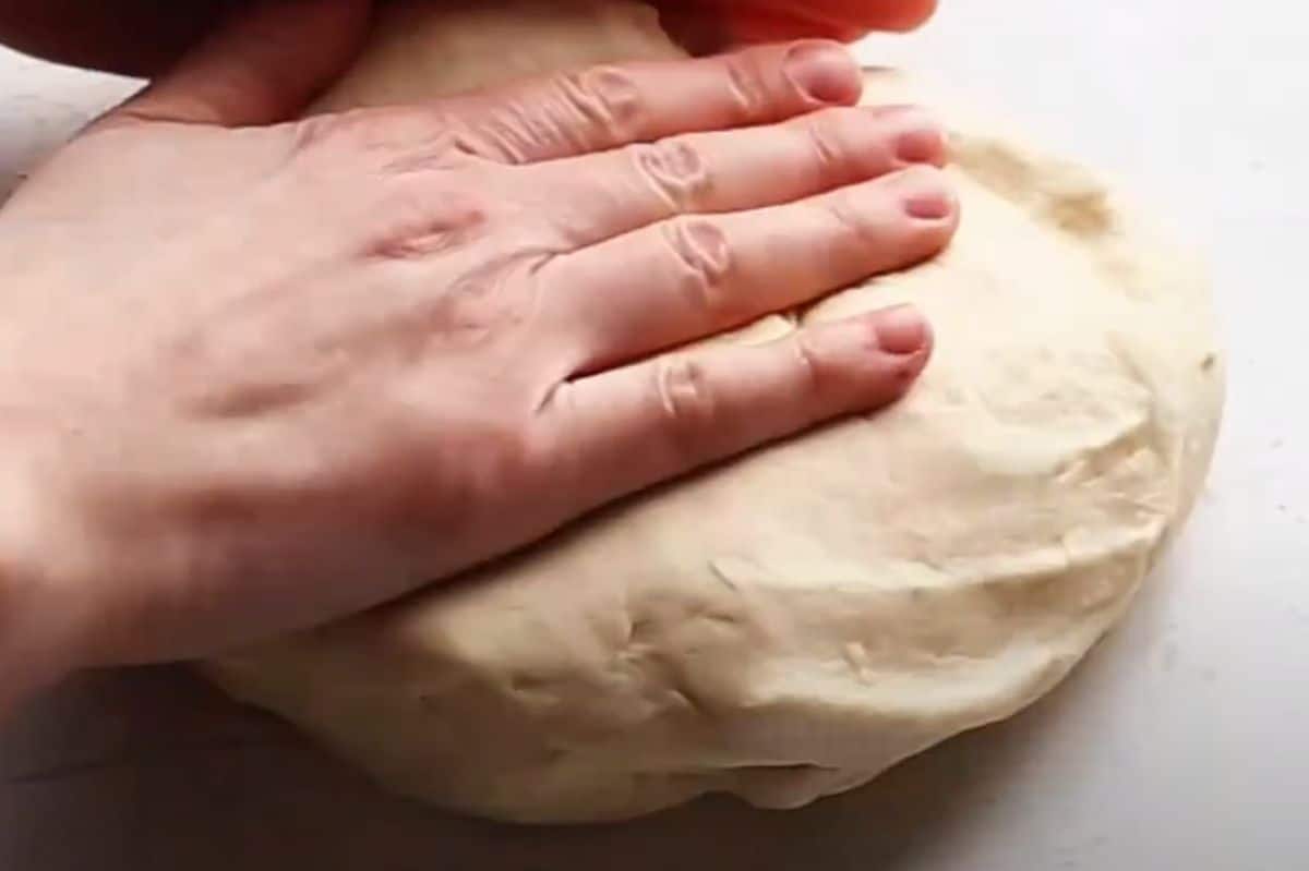 kneading croissant dough