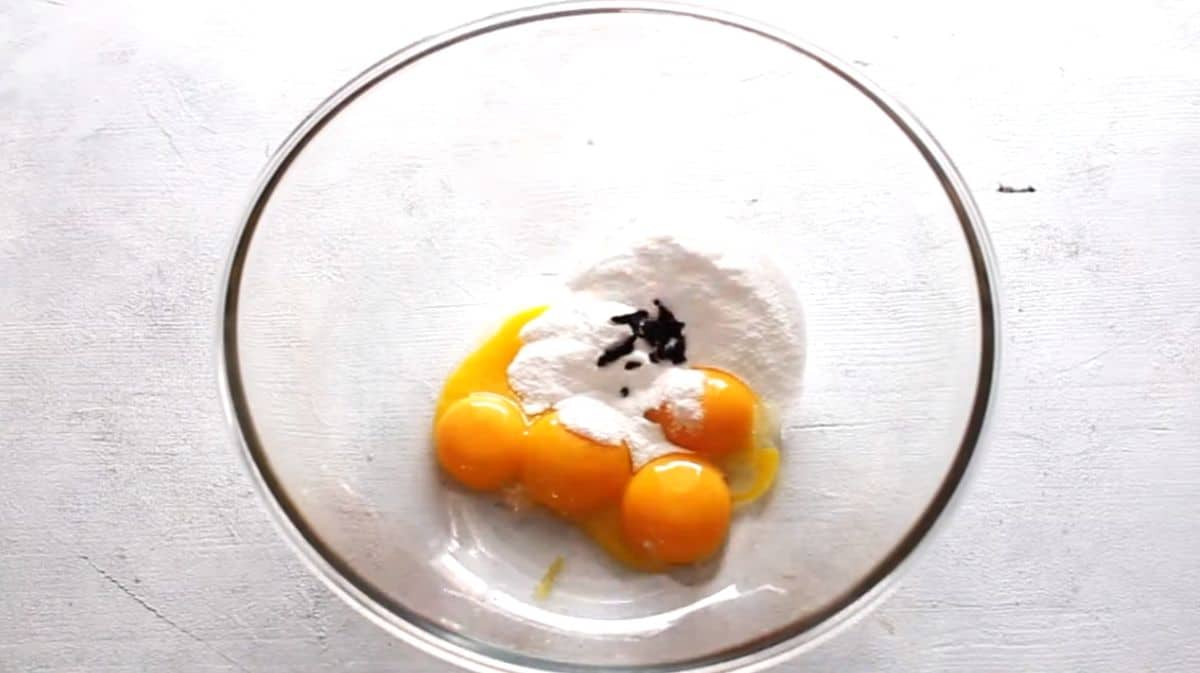 egg yolks, sugar, and vanilla seeds in a bowl