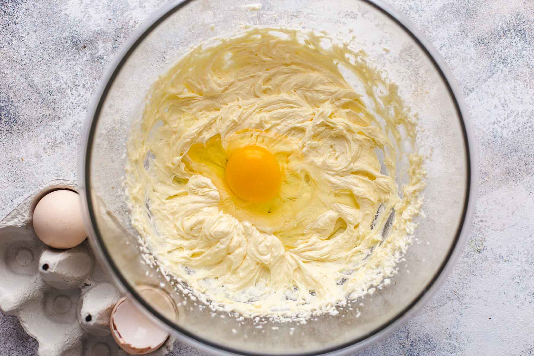 Mixing progress: adding second egg to the batter