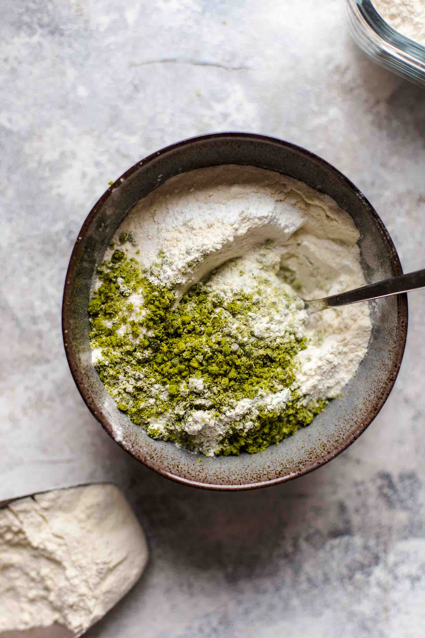 Ground pistachio, flour, baking powder, and salt in a small bowl