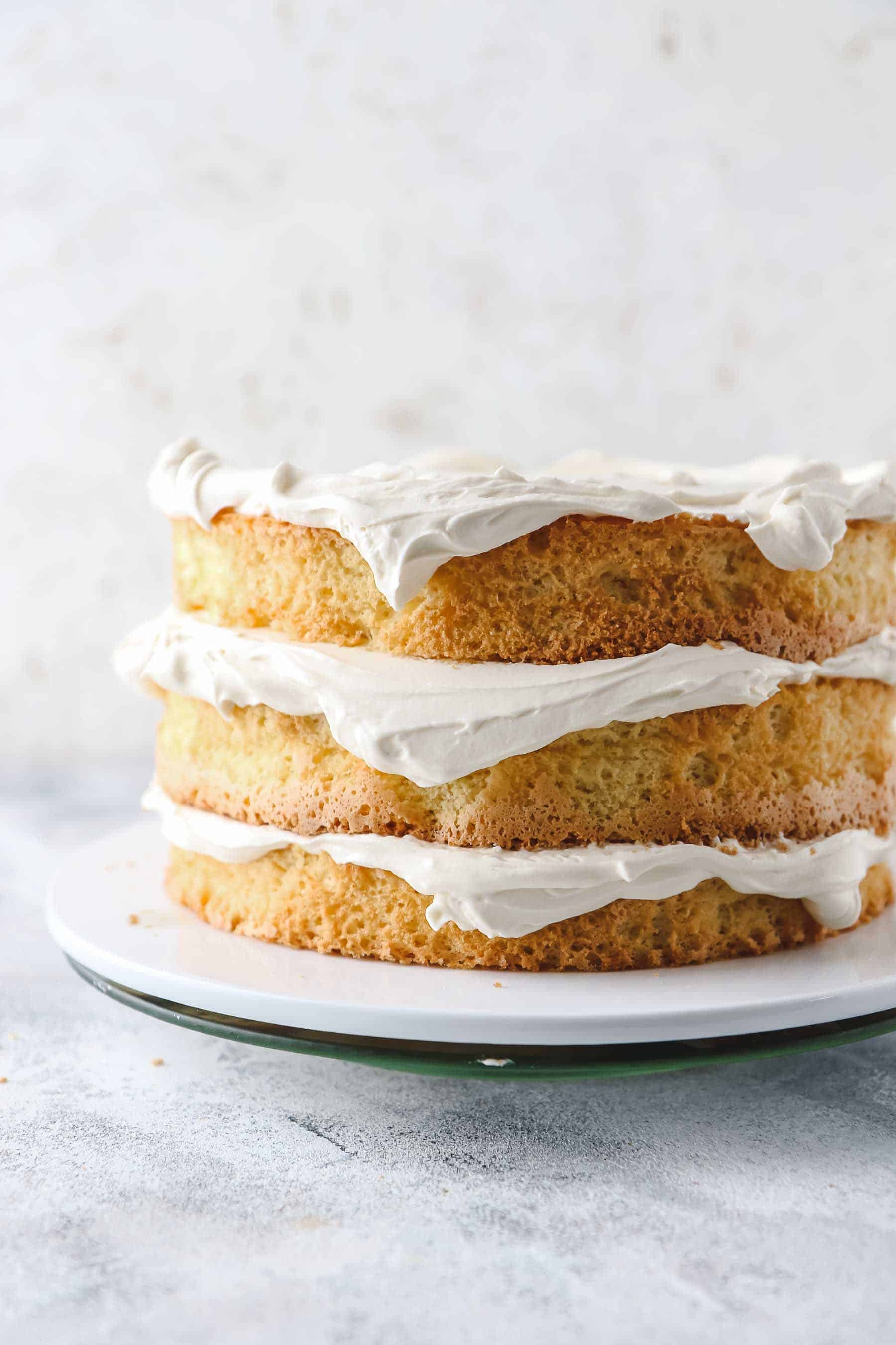 three cake layers filled with mascarpone frosting