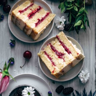 Cut cherry cake slices on plates