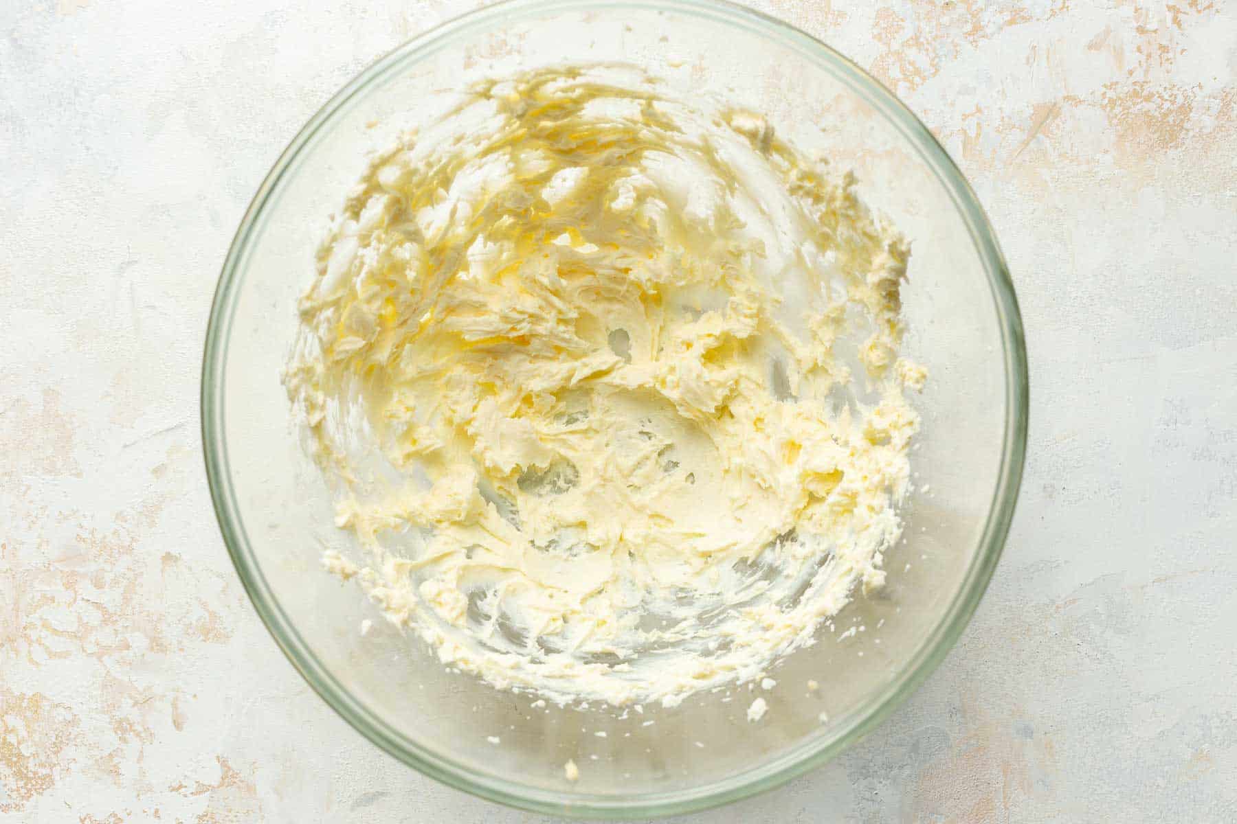 mixed butter and cream cheese in a glass bowl