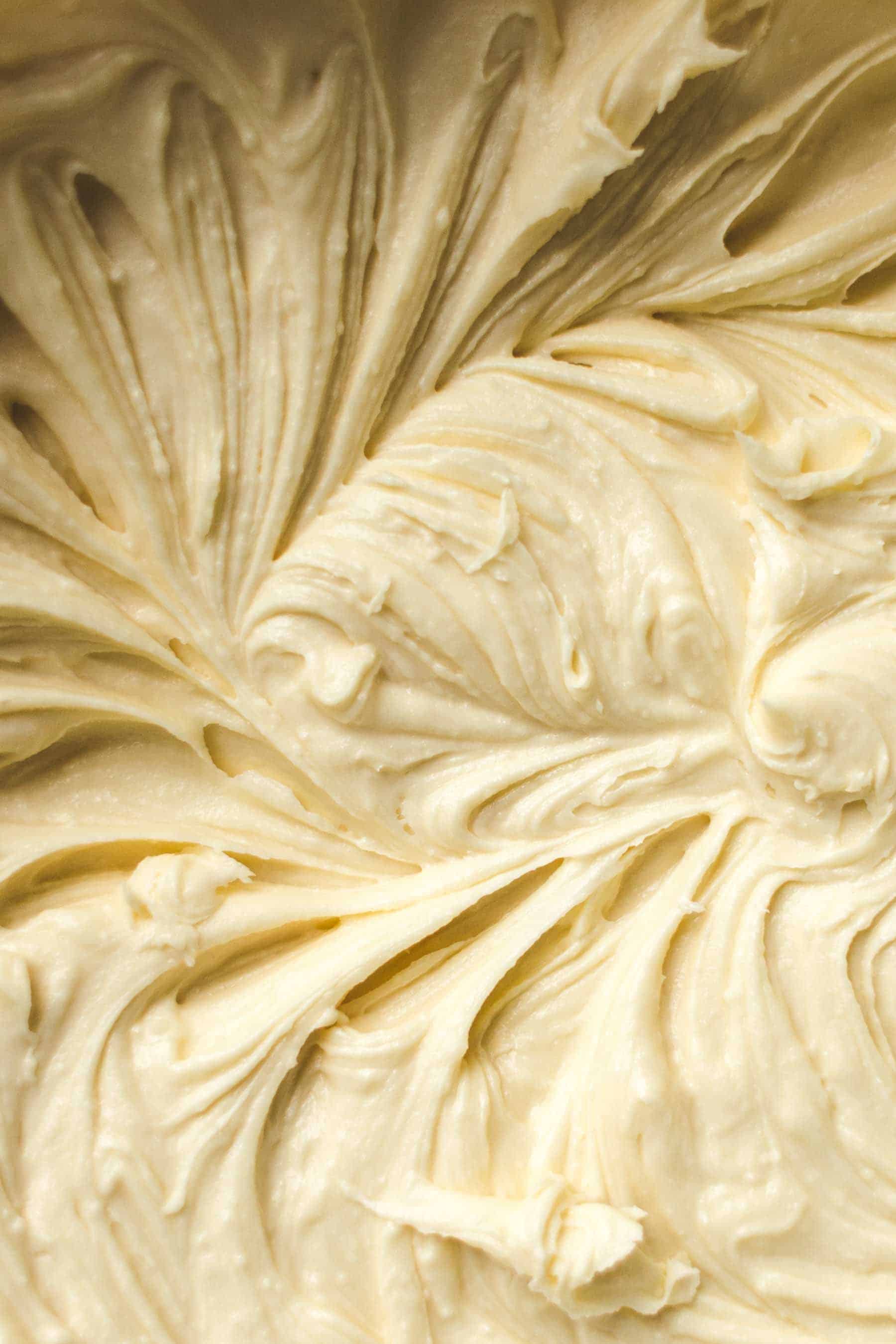 close up of whipped white chocolate frosting