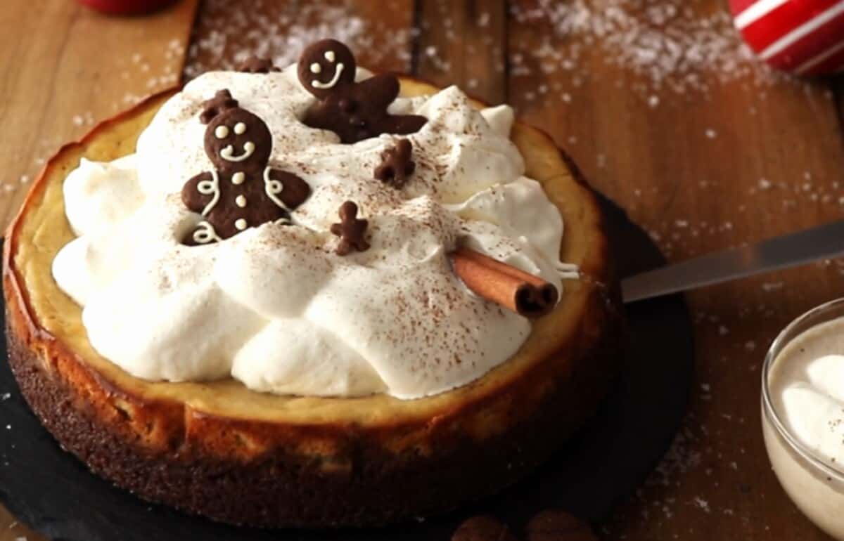 eggnog cheesecake with gingerbread man on top