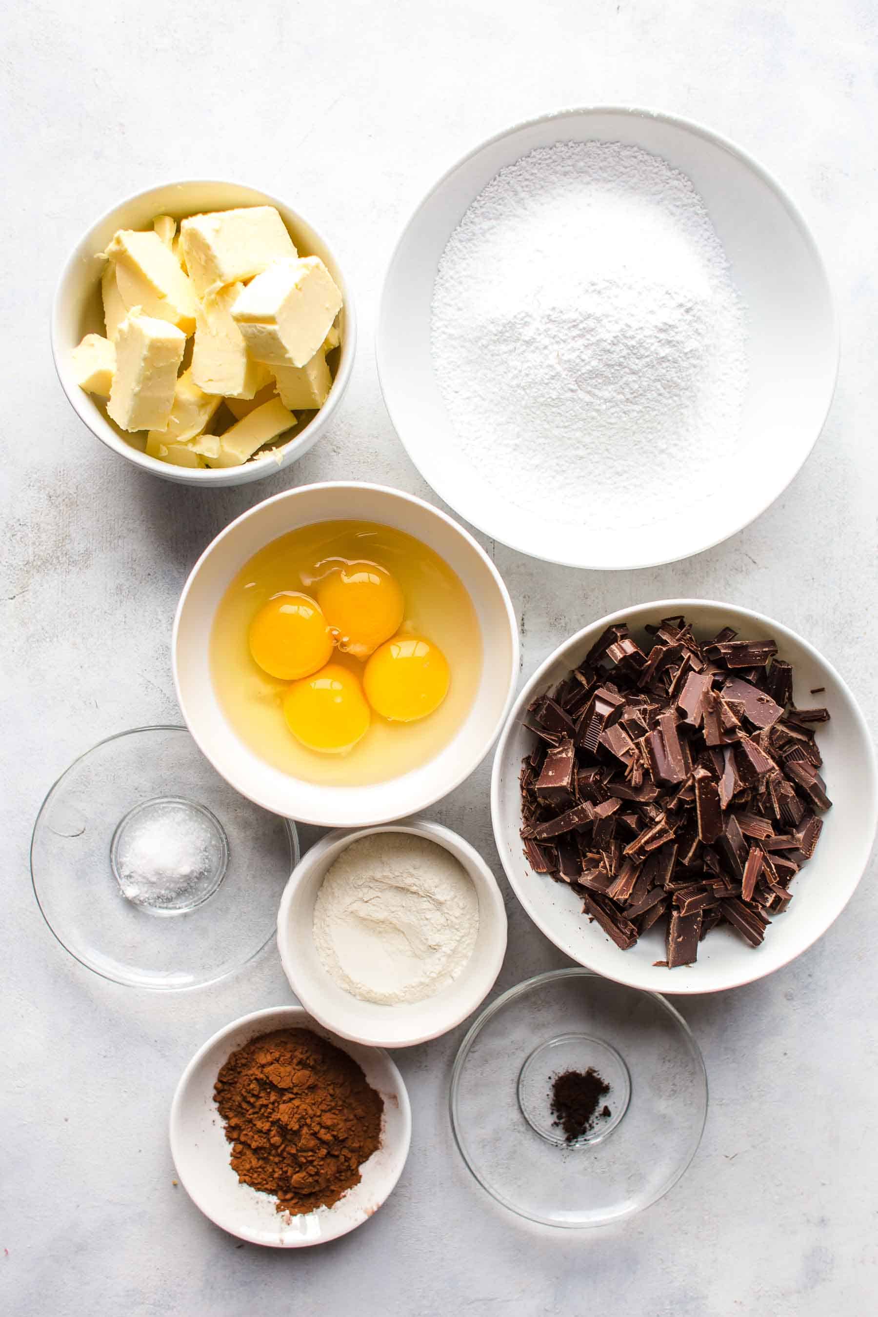 ingredients for chocolate batter in individual bowls