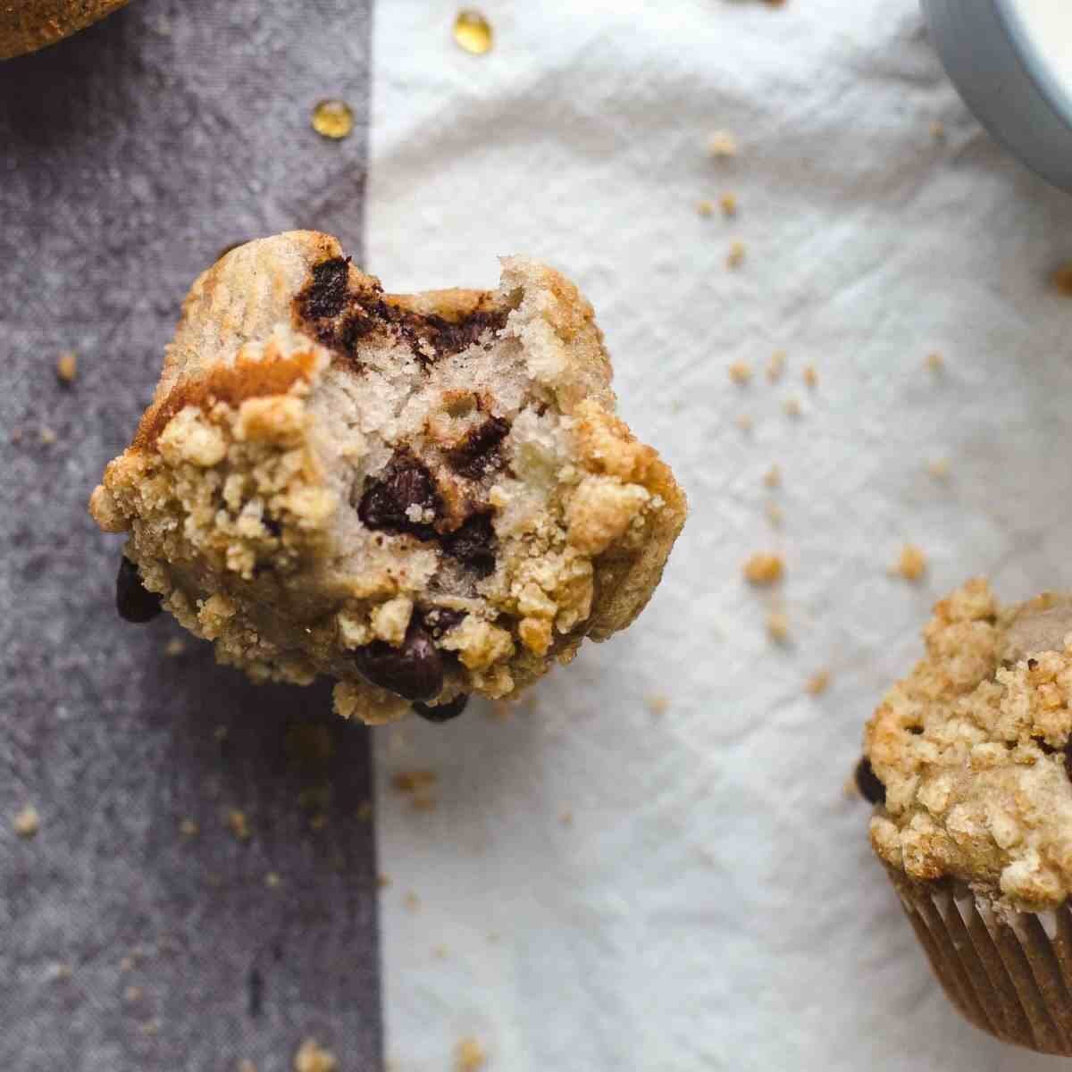Bitten Banana Chocolate Chip Muffins at breakfast overhead shot
