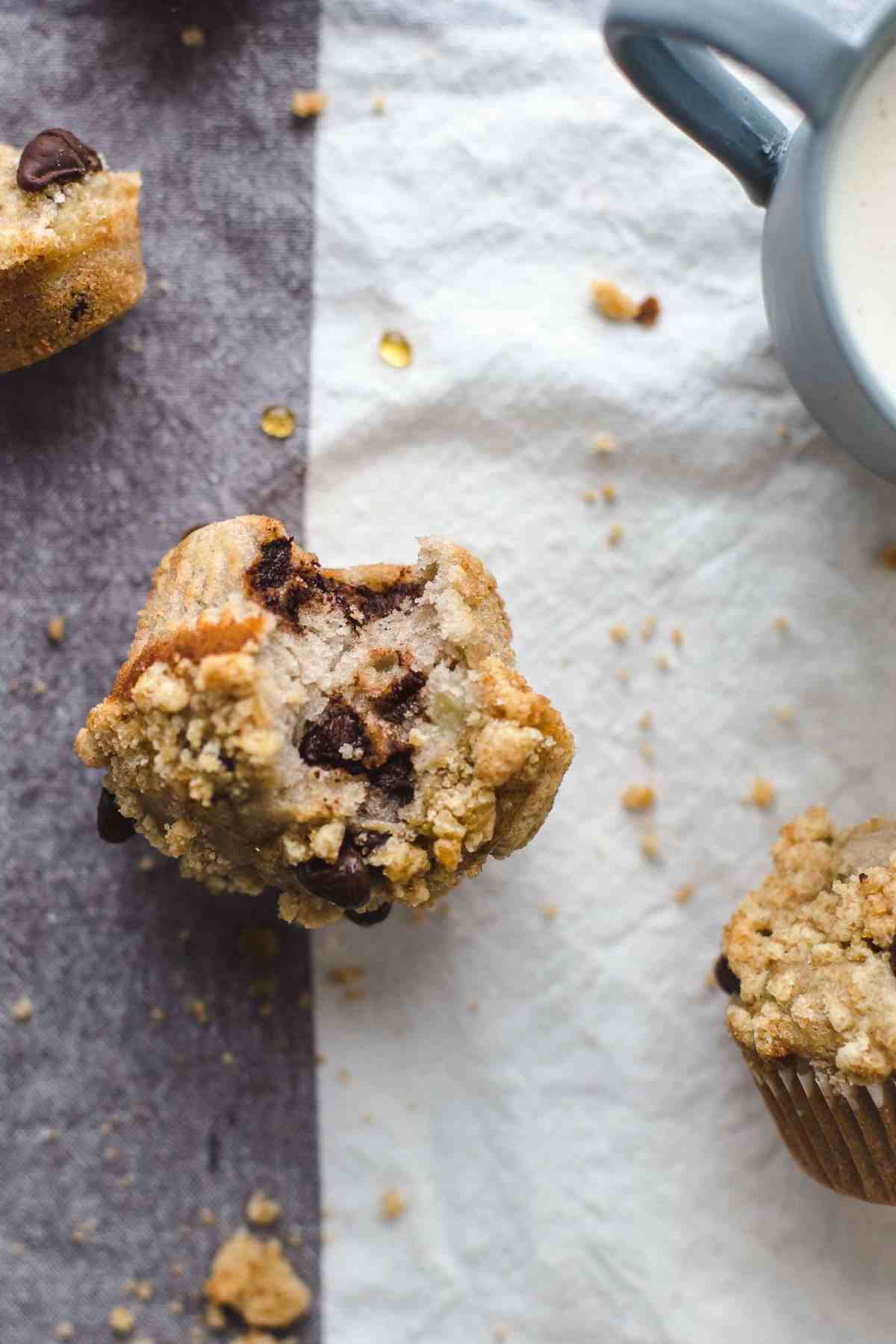Bitten Banana Chocolate Chip Muffins at breakfast overhead shot