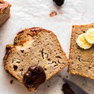 cut banana bread with chocolate spread and banana slices