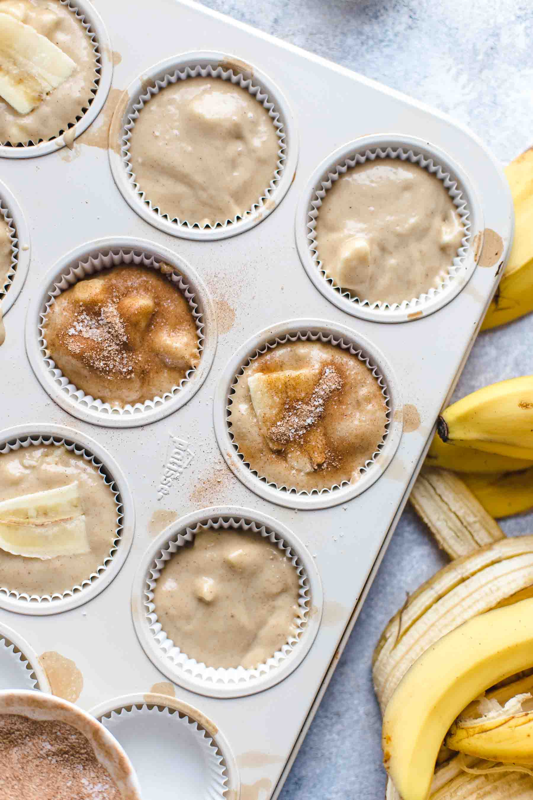 unbaked banana bread muffins in pan