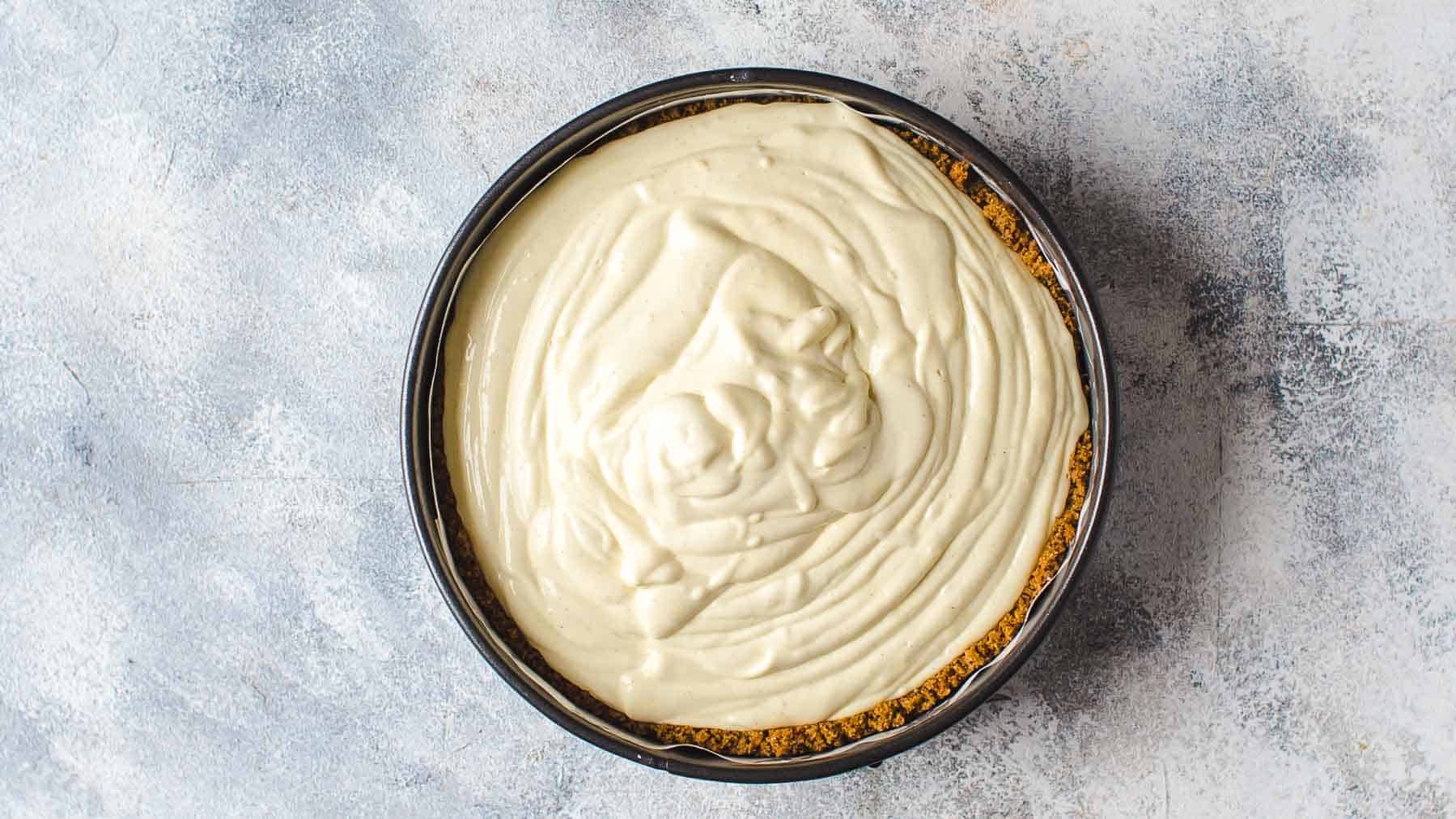 Lemon cheesecake filling in springform pan