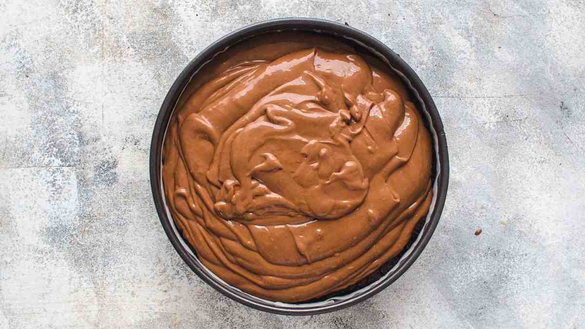 unbaked cheesecake in springform pan