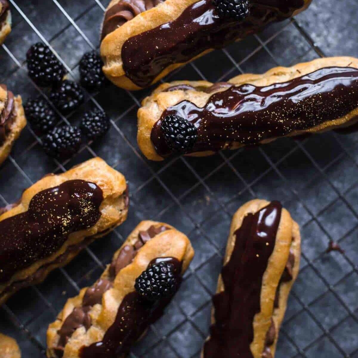 ready to serve chocolate eclairs on wire rack