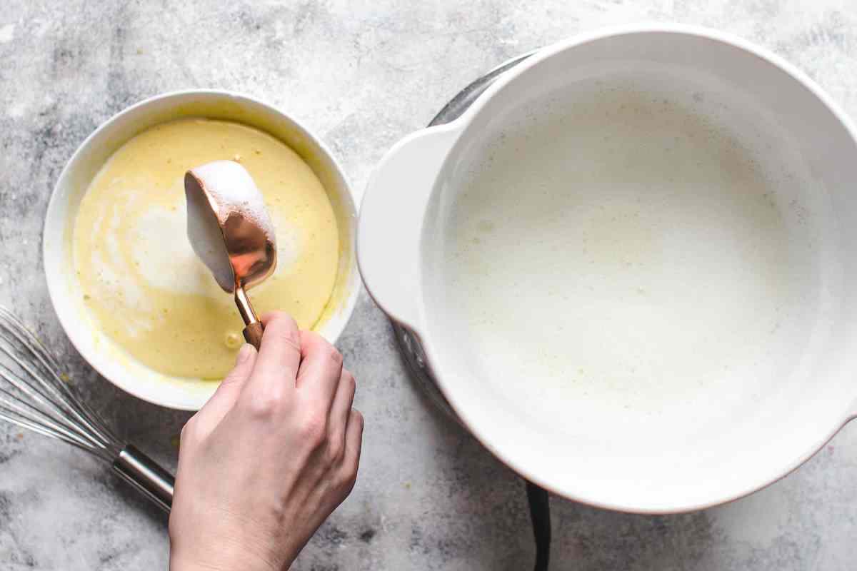 Tempering egg yolks with hot milk