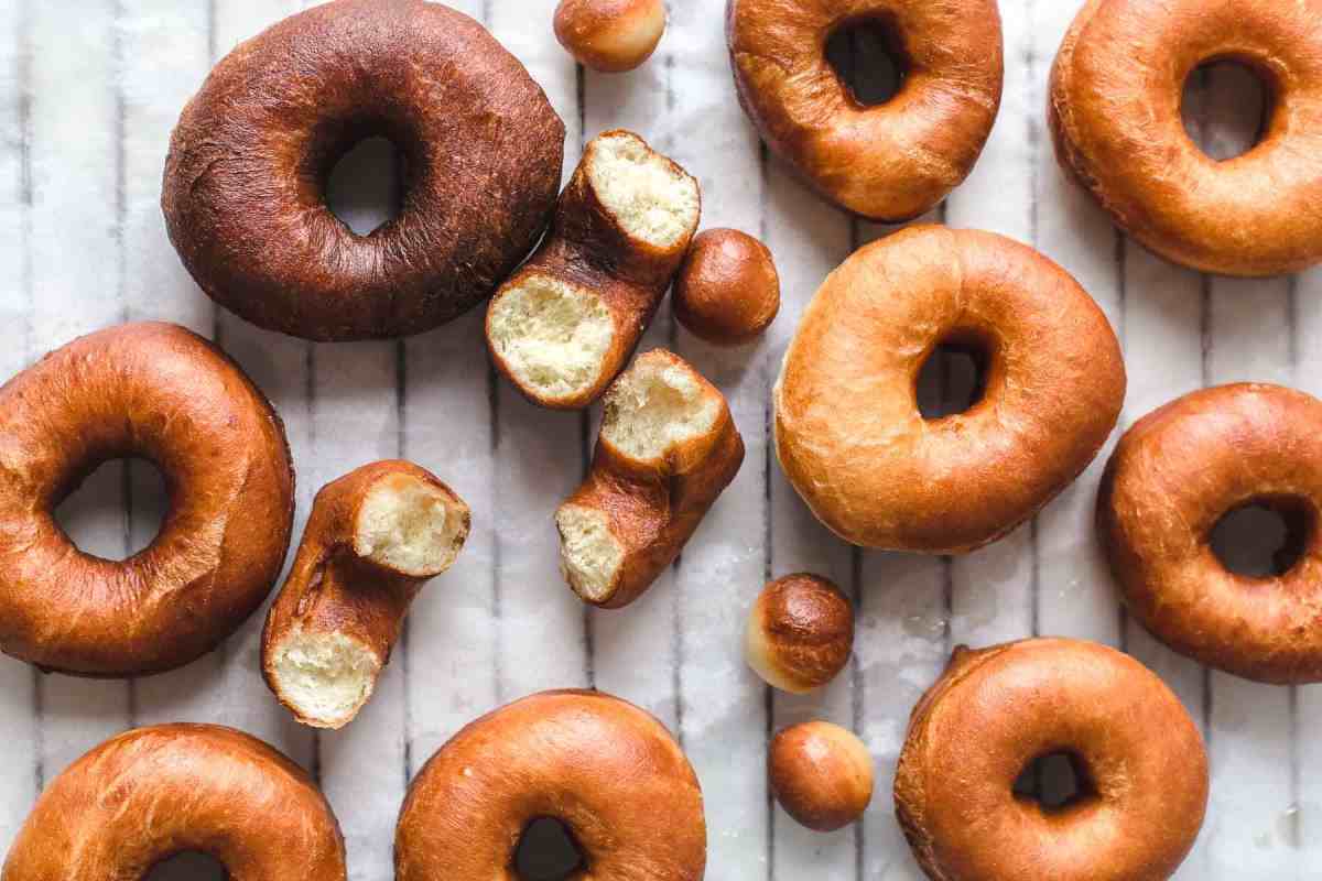 Fried donuts on baking sheet
