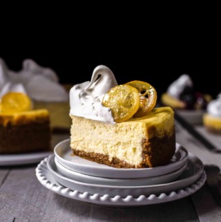 A slice of lemon cheesecake on a dessert plate