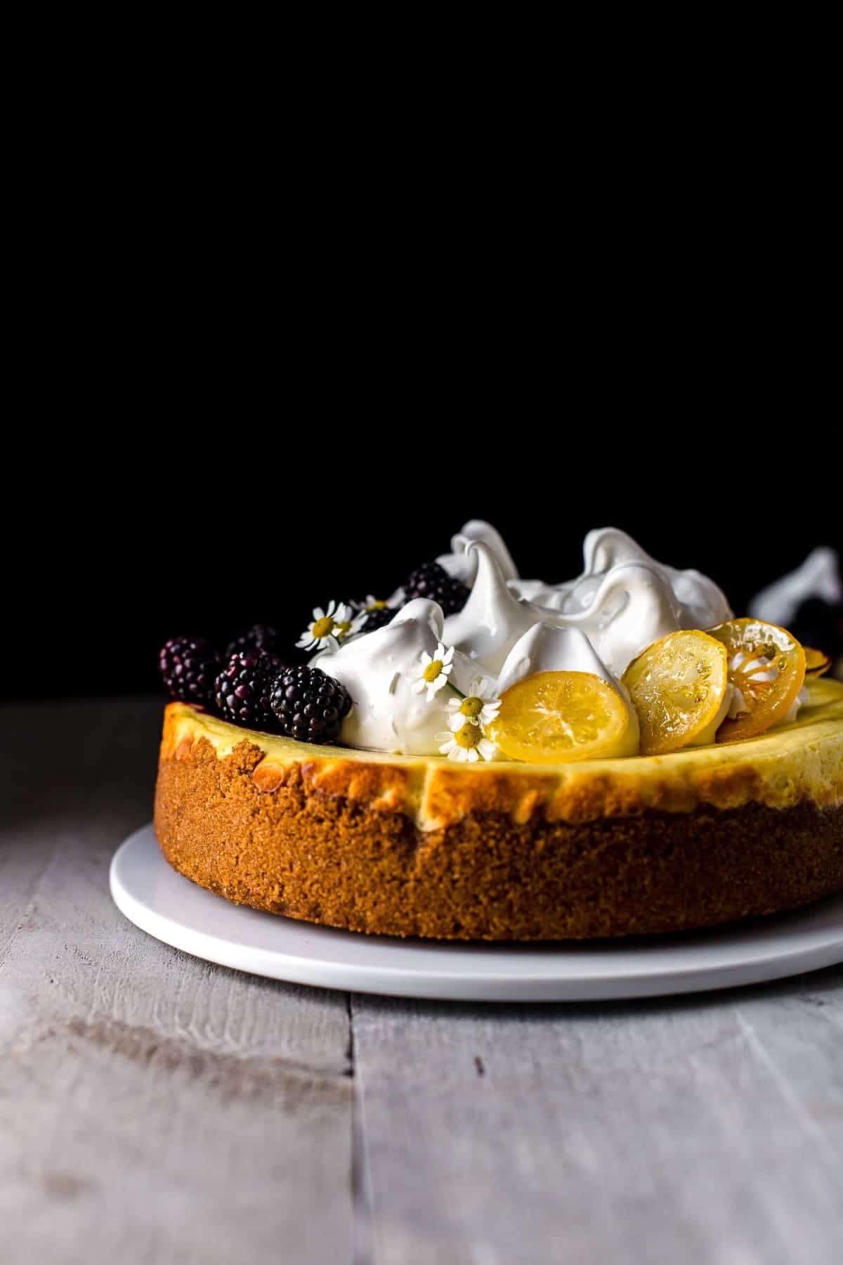 Baked and decorated Lemon Cheesecake on serving plate