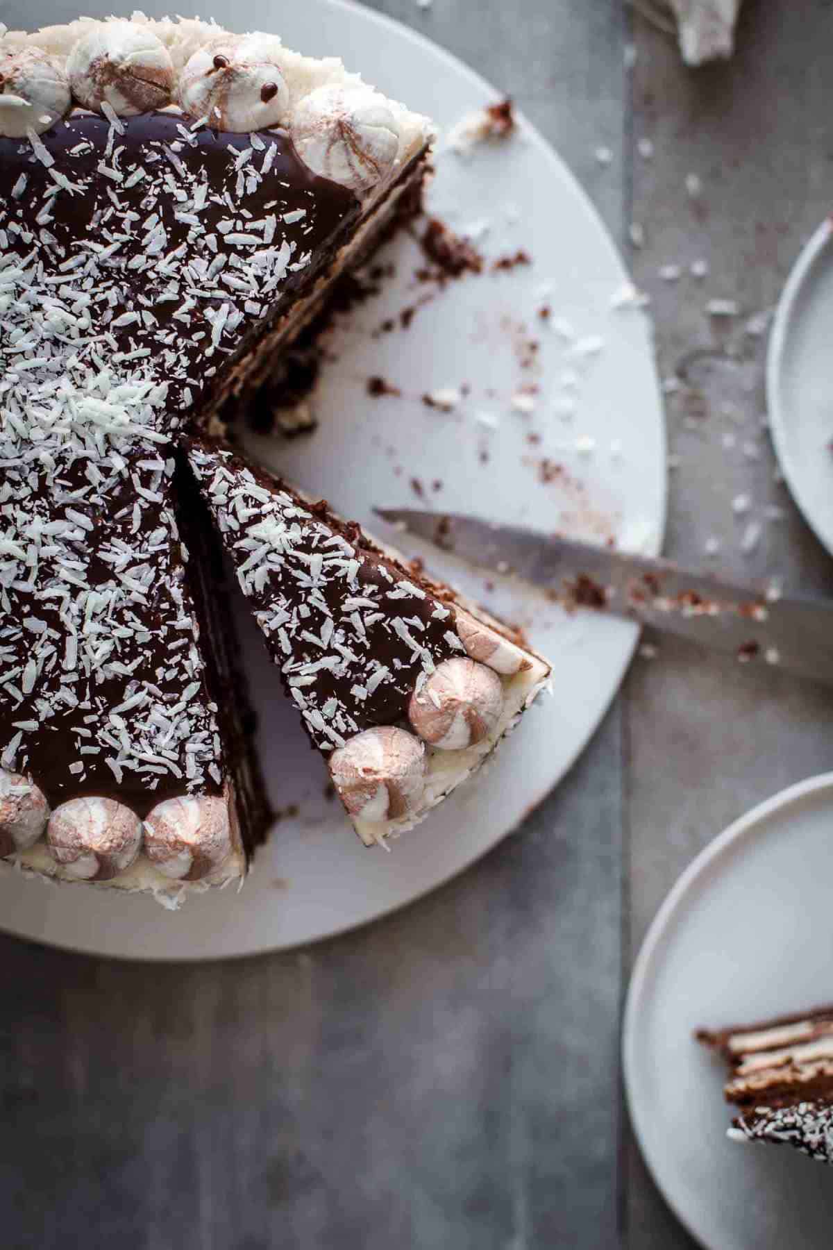Cut Coconut Chocolate Cake top down on serving plate