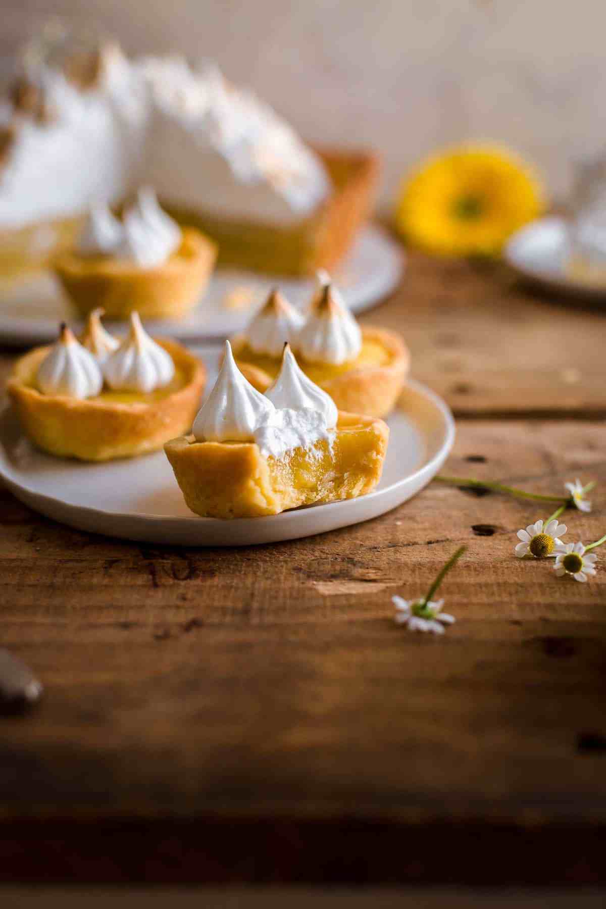 Lemon Meringue Tartlets on dessert plate