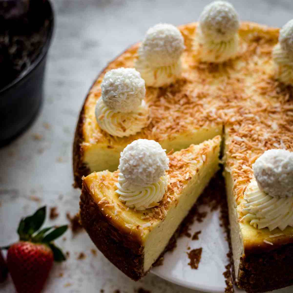 Sliced Coconut Cheesecake on a serving plate