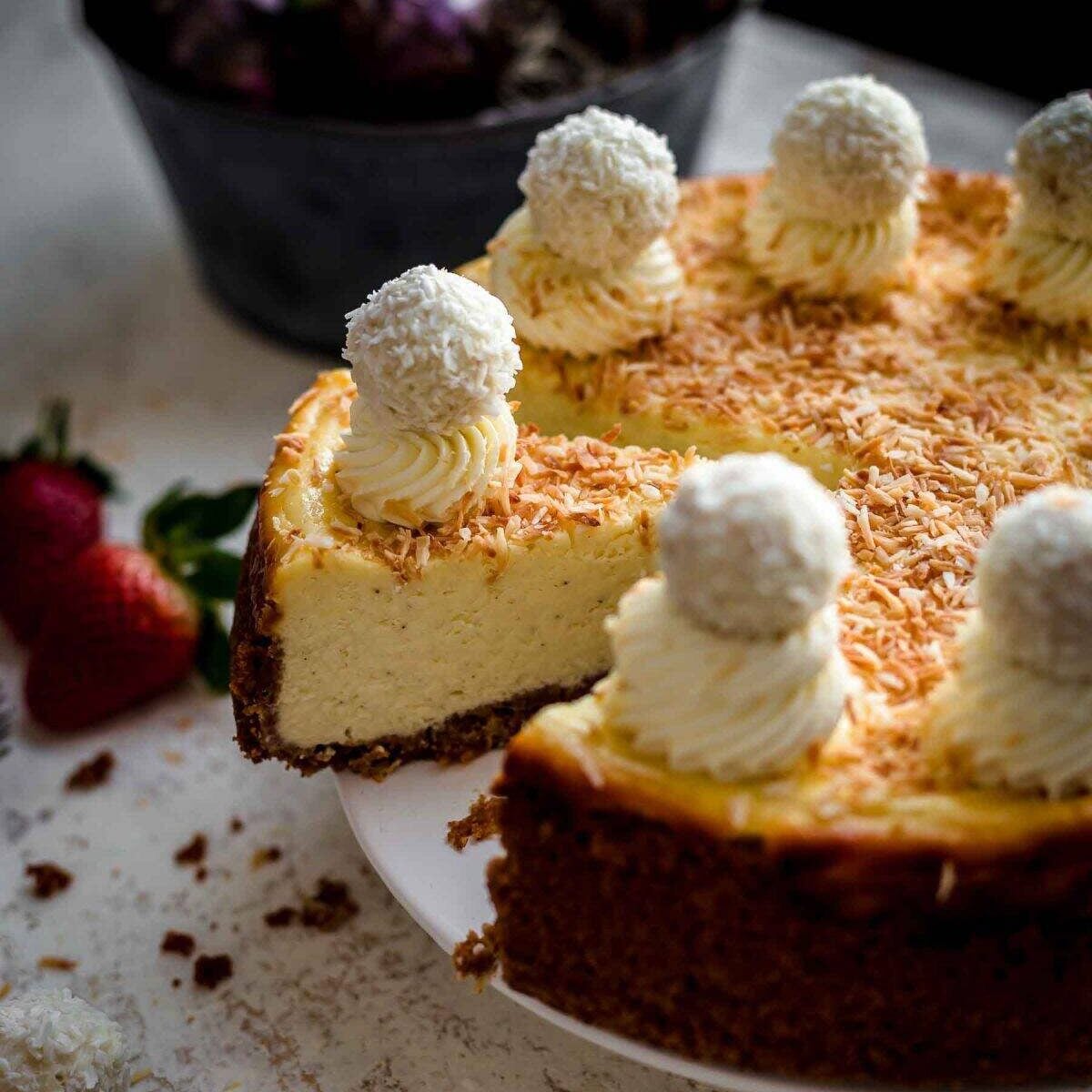 Coconut Cheesecake slice on serving plate