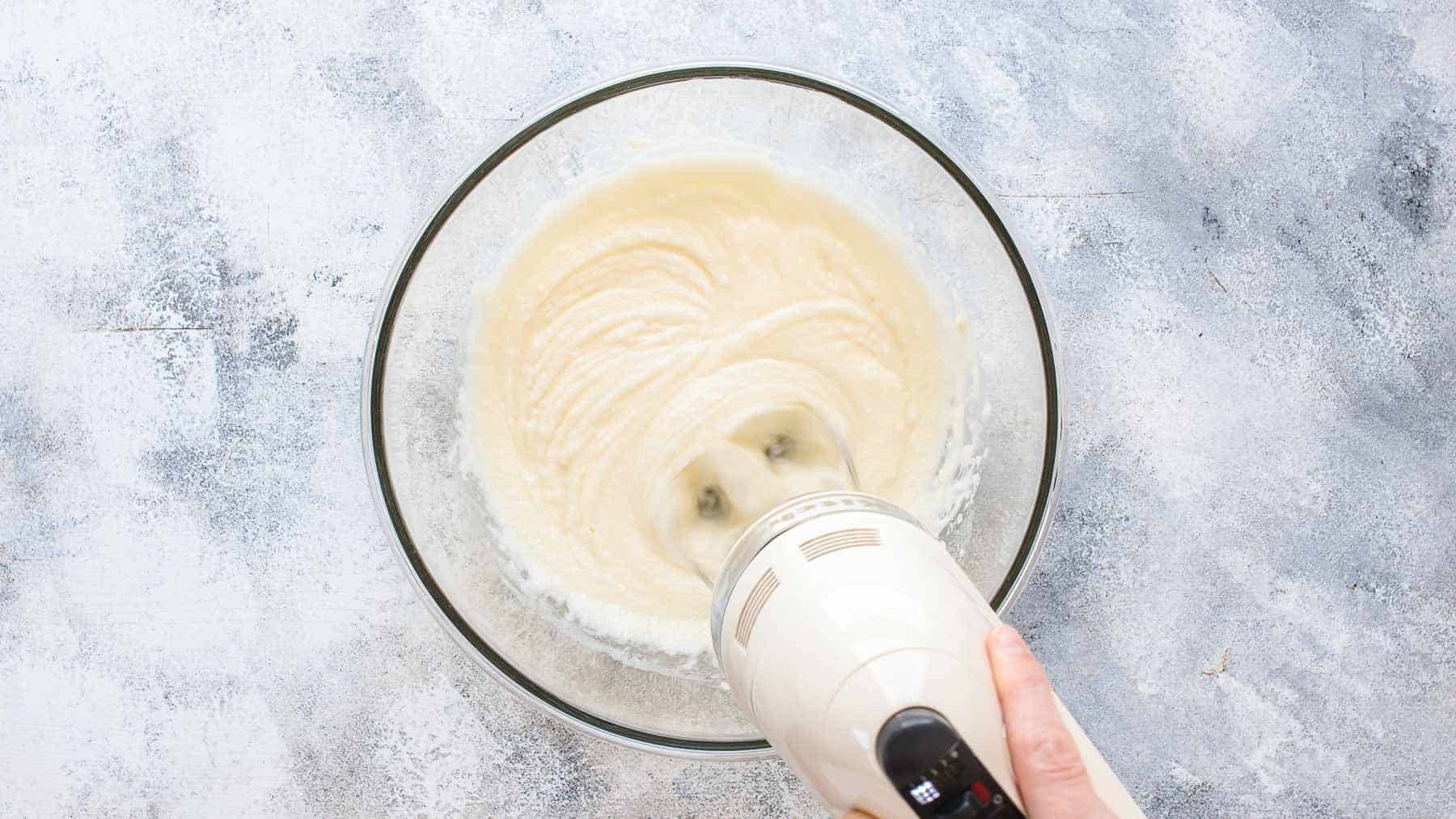 mixing up batter for the cake