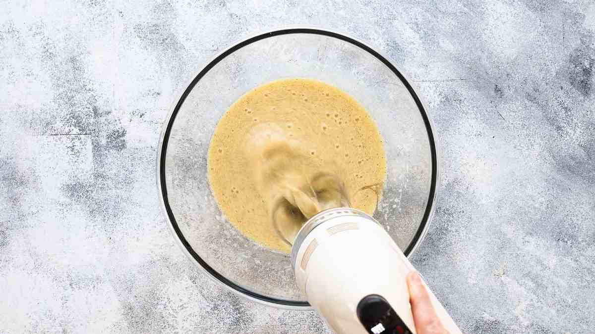 batter for chocolate bundt cake with hand mixer
