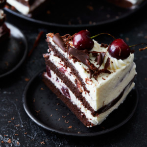 A slice of Black Forest cake on a dessert plate