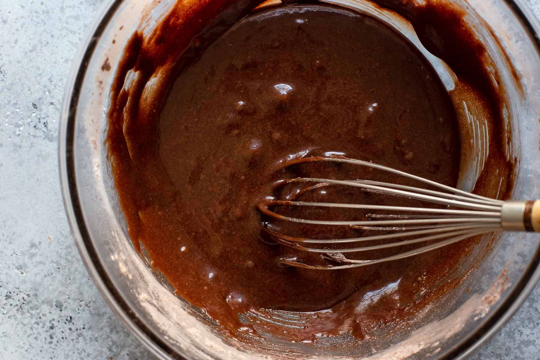 chocolate batter in a glass bowl