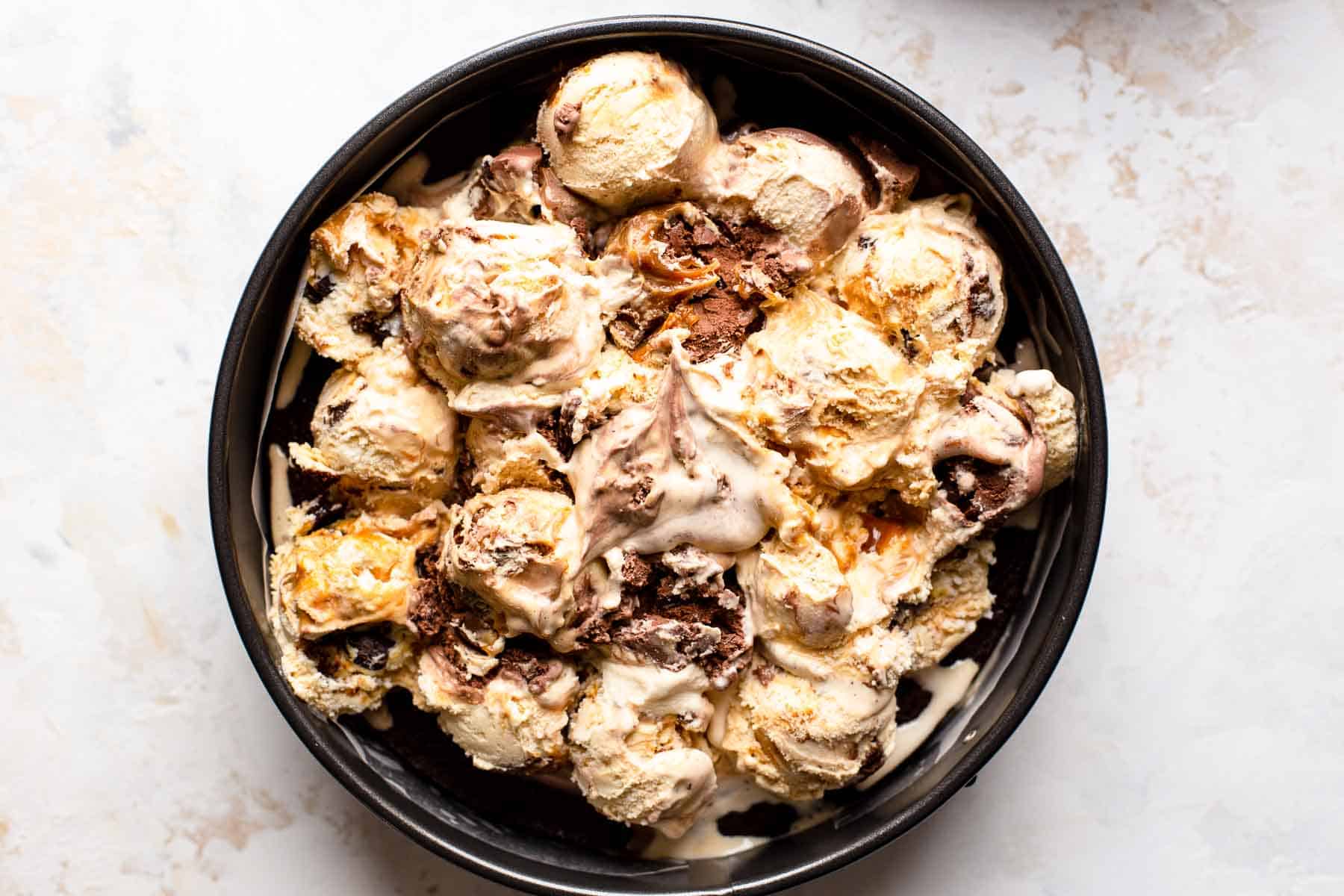scoops of ice cream in a spring form pan
