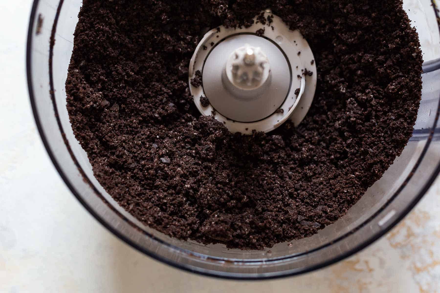 processed oreo crumbs in a food processor