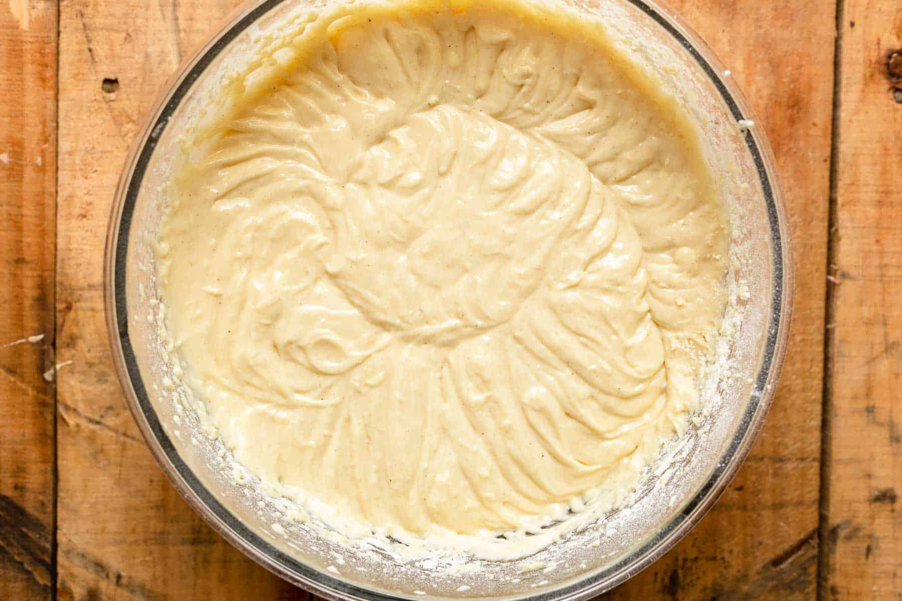 mixed, thick cake batter in a large mixing bowl