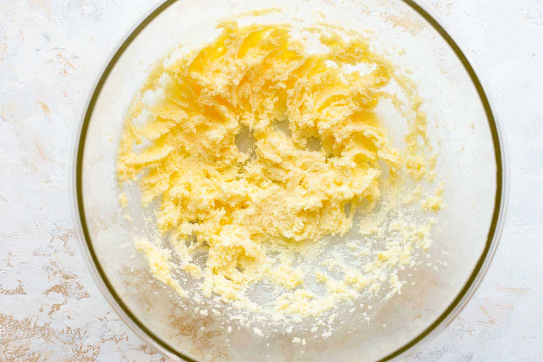 creaming butter and sugar in a mixing bowl
