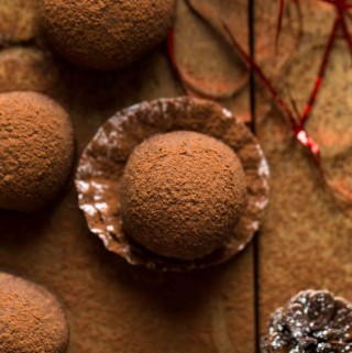 several chocolate rum balls ready to serve