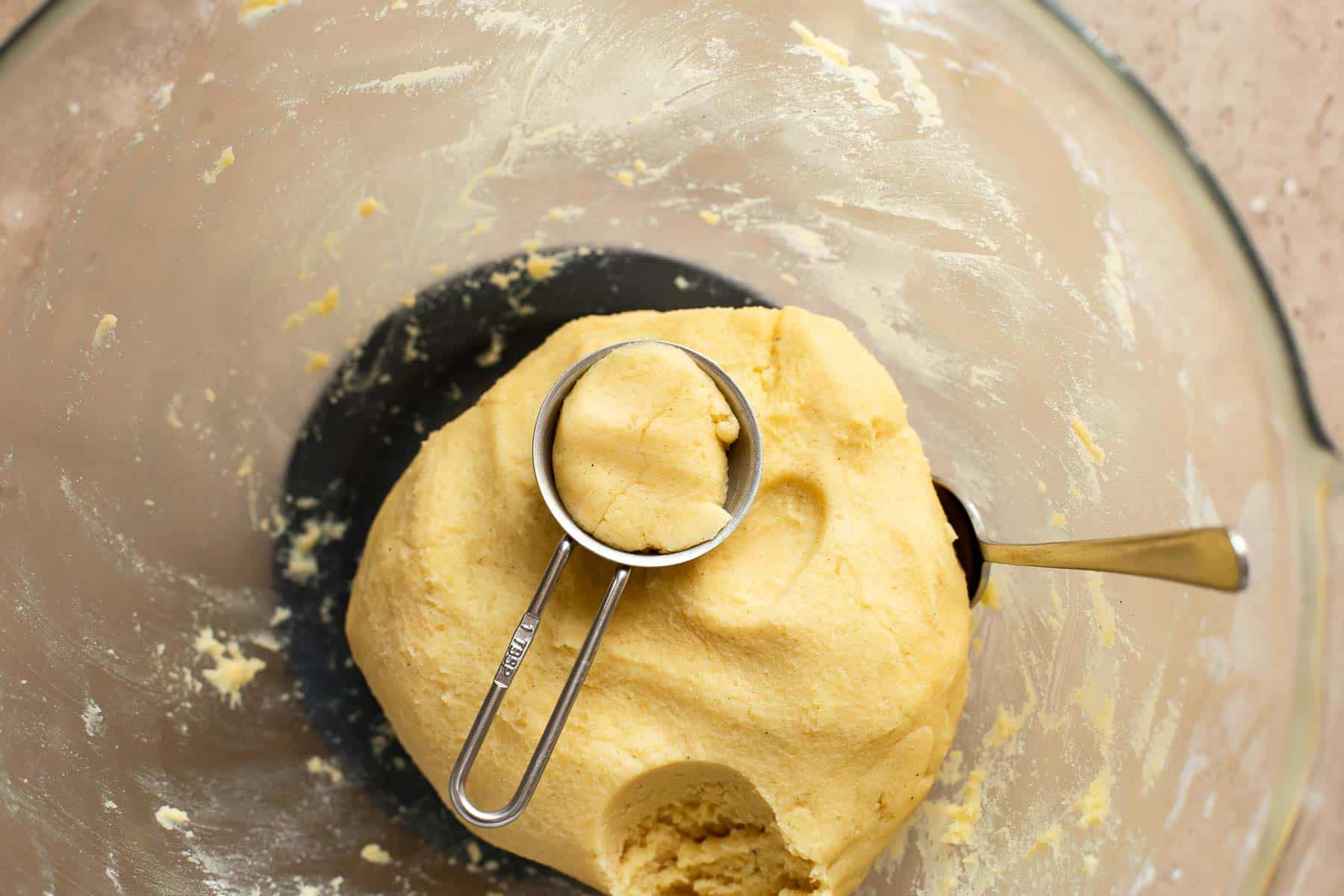a tablespoon filled with cookie dough