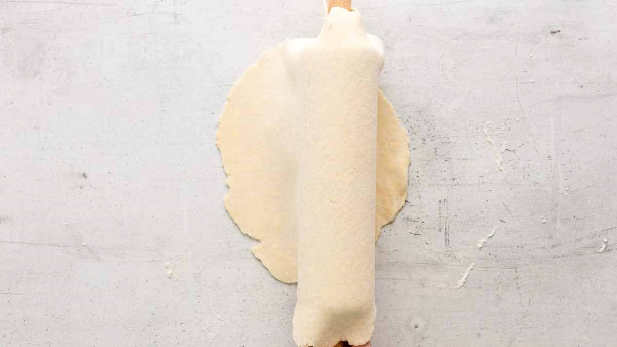 rolling out homemade pie crust