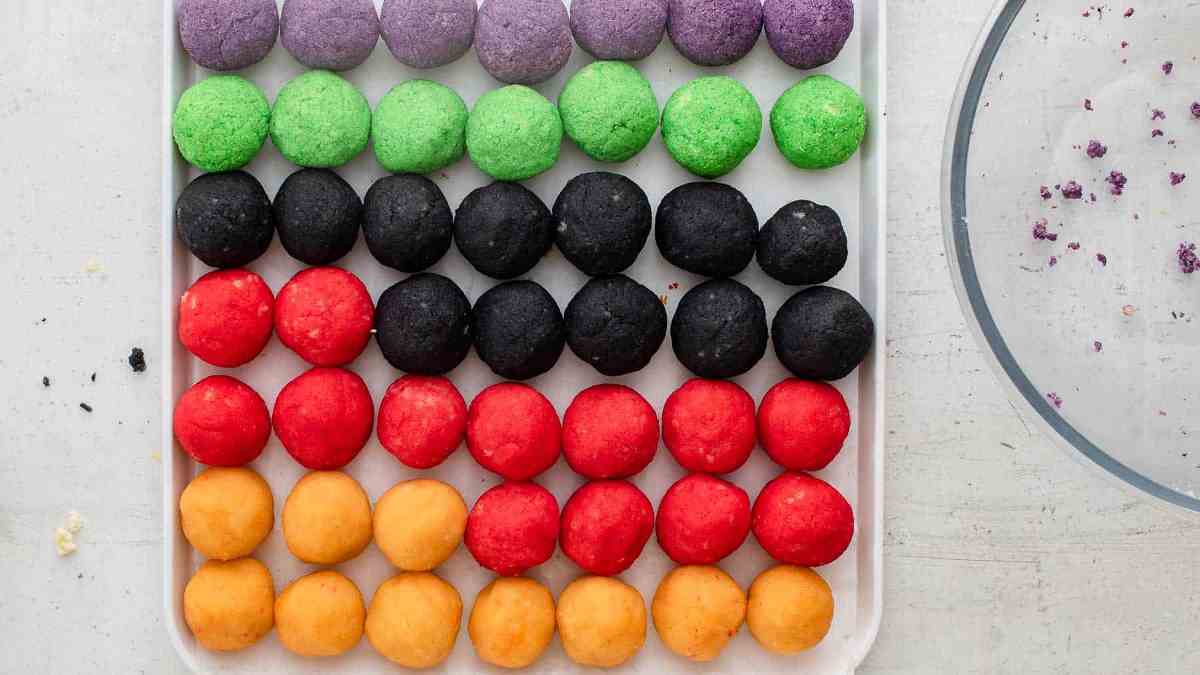 rolled cake balls on a pan