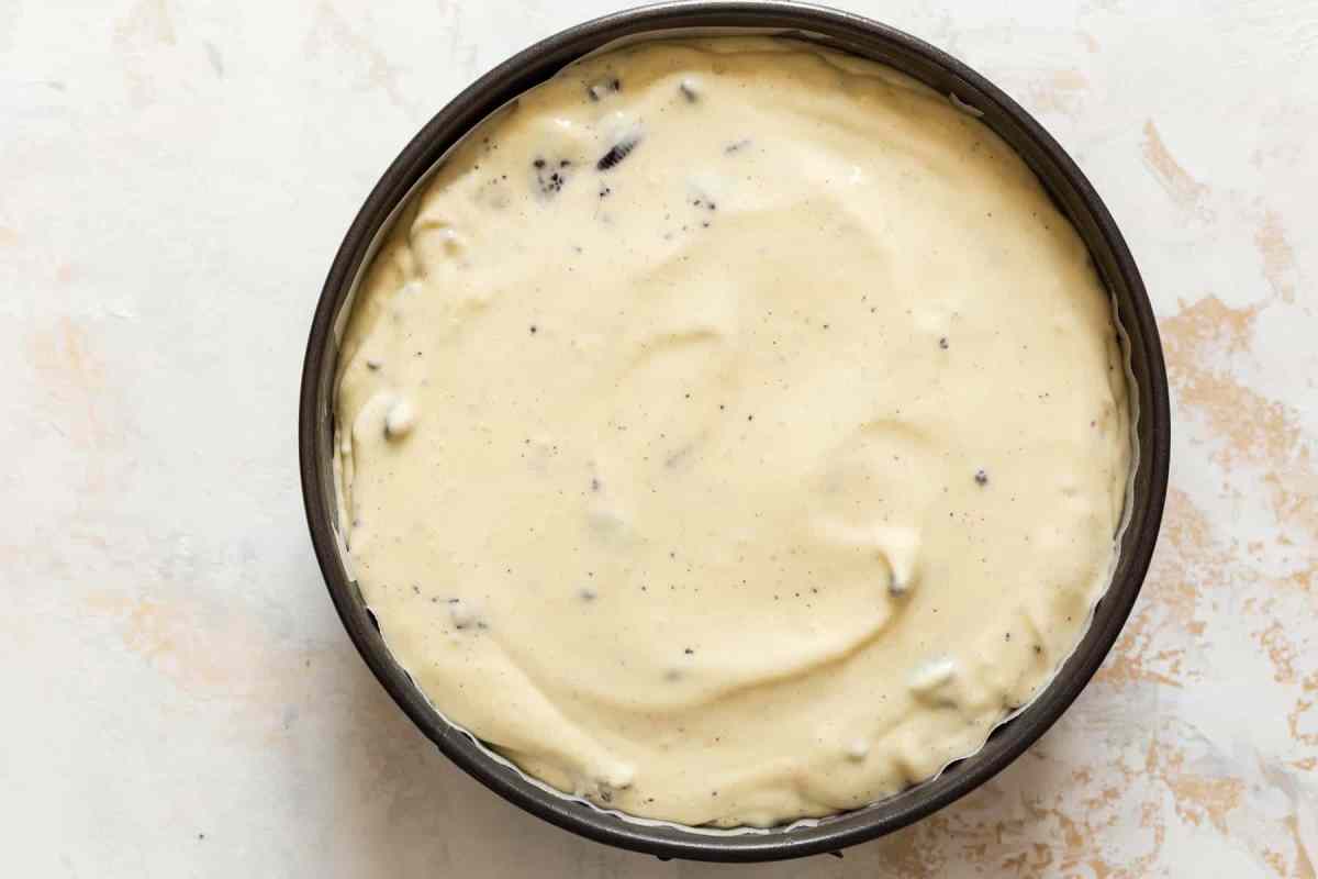 oreo cheesecake batter in a pan
