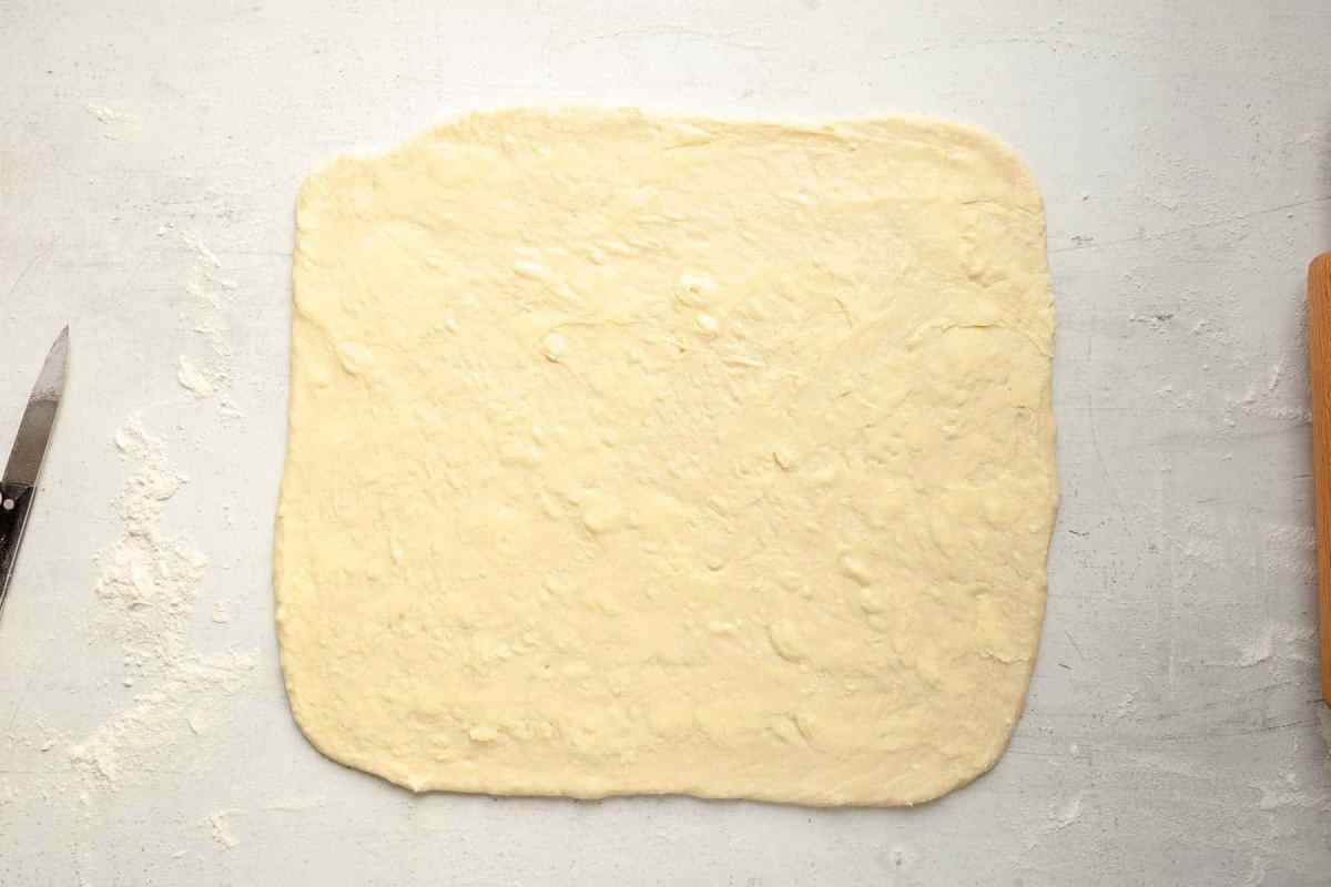 dough rolled into rectangle for chocolate rolls