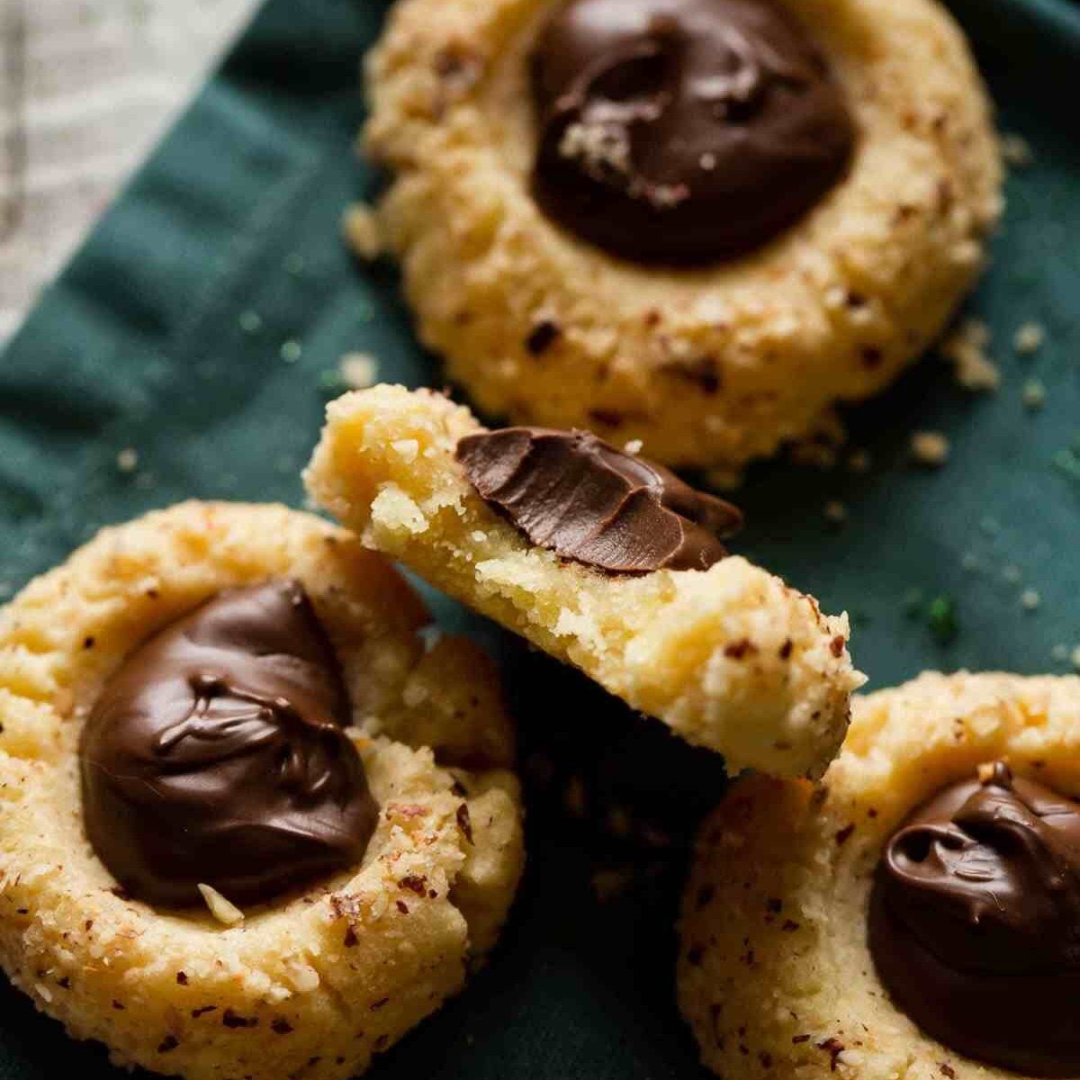 christmas thumbprint cookies one with bite out of it