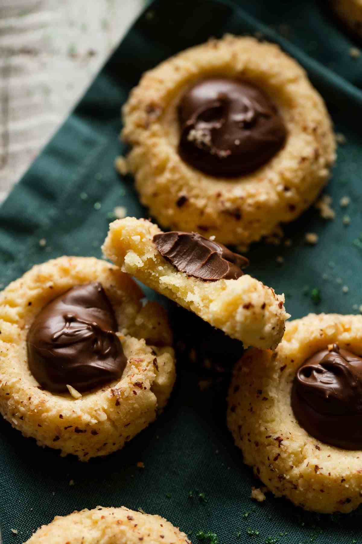 christmas thumbprint cookies one with bite out of it