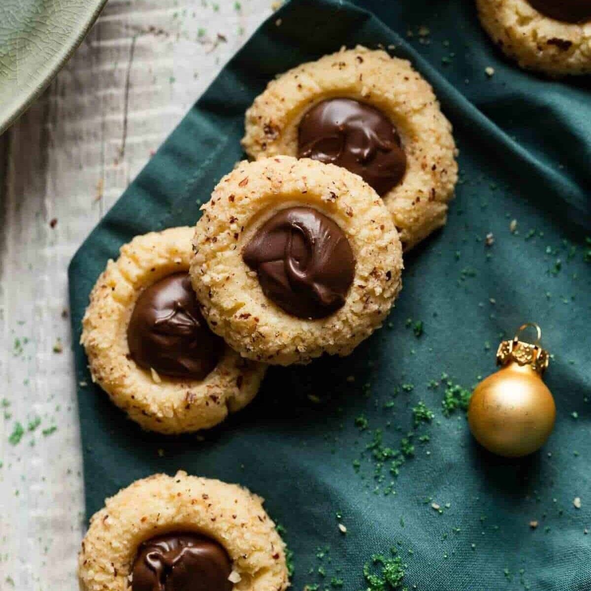 several christmas cookies with an ornament