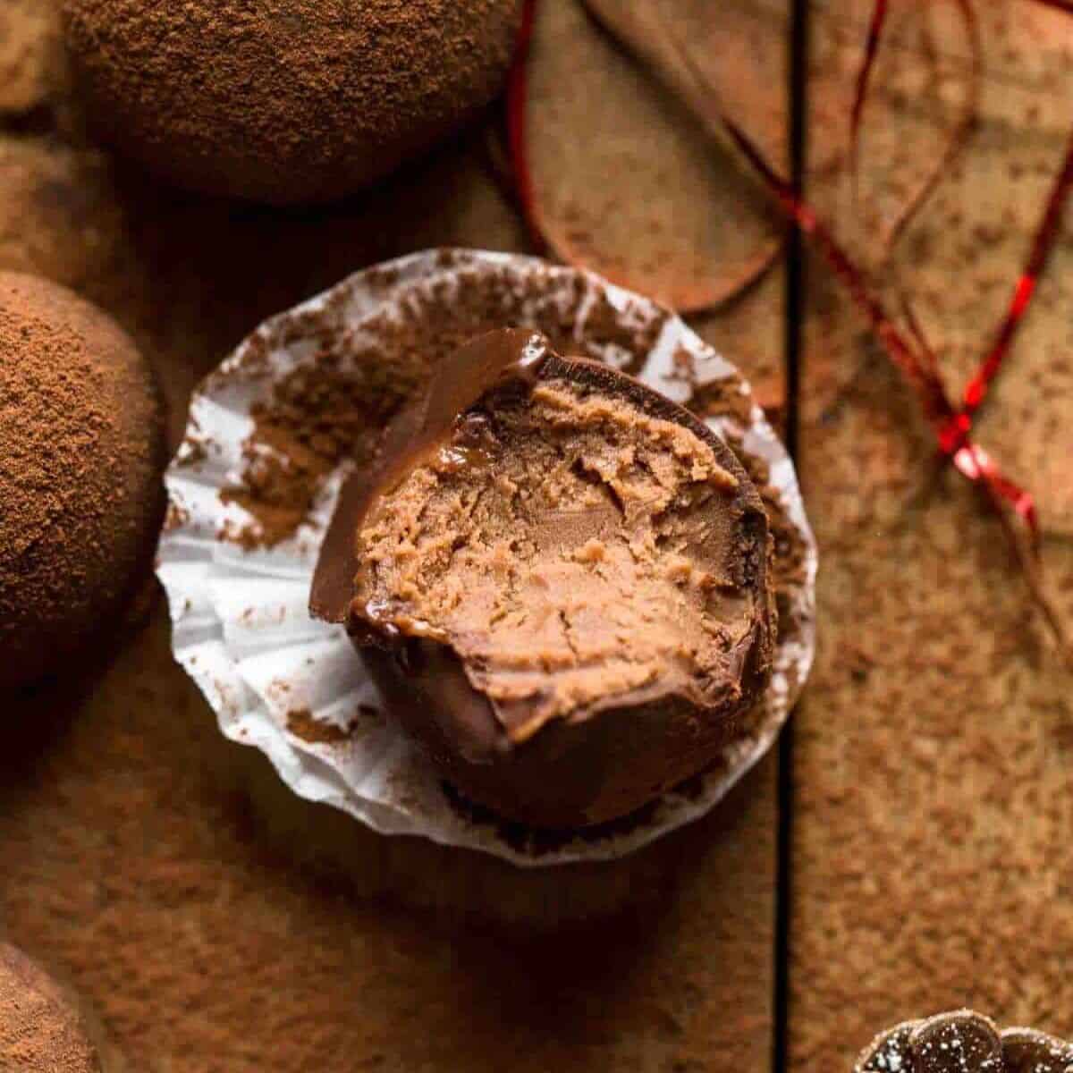 A half chocolate truffle with a delicious chocolate center.