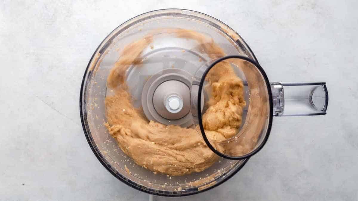 peanuts being mixed in food processor