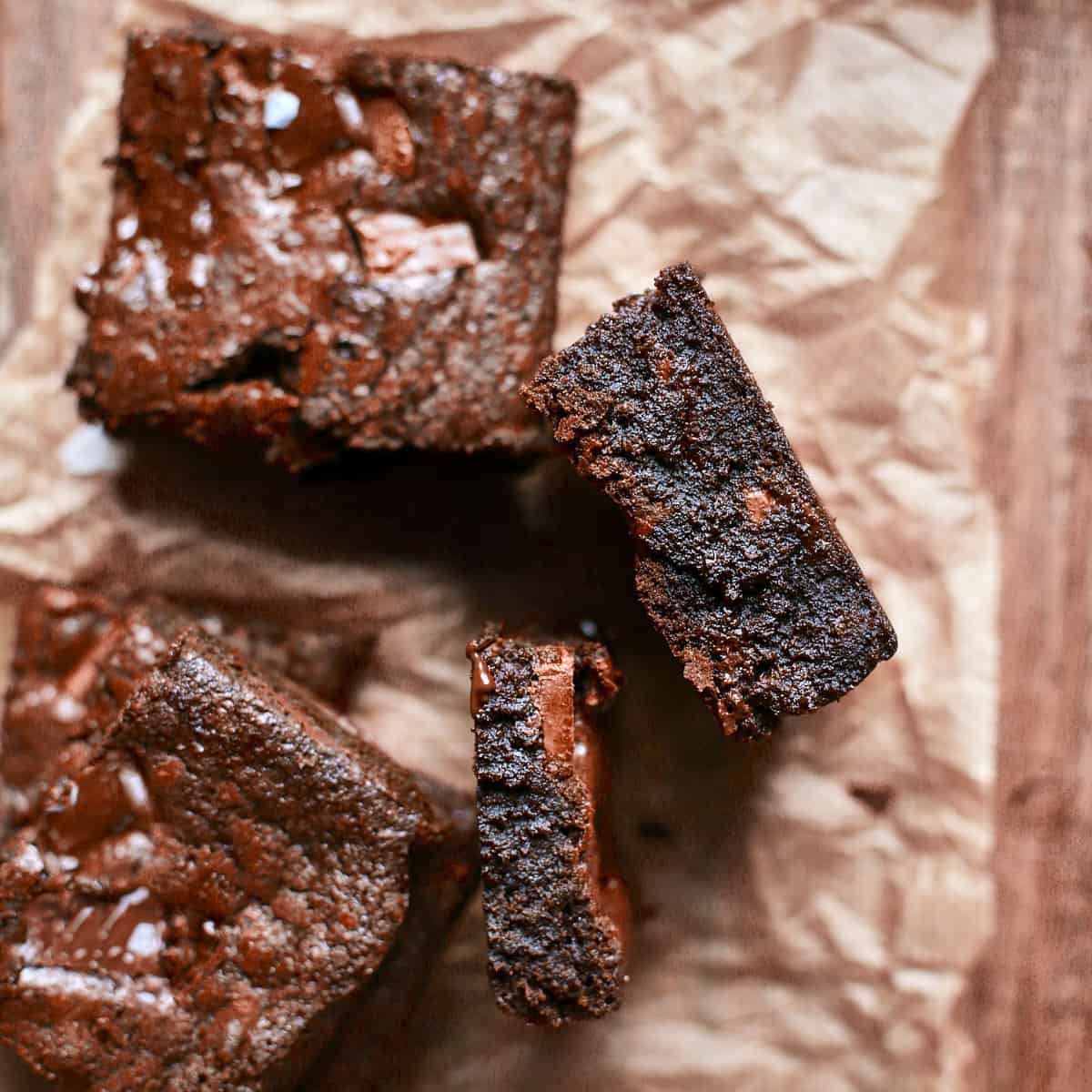 Decorative picture of baked brownies on brown background