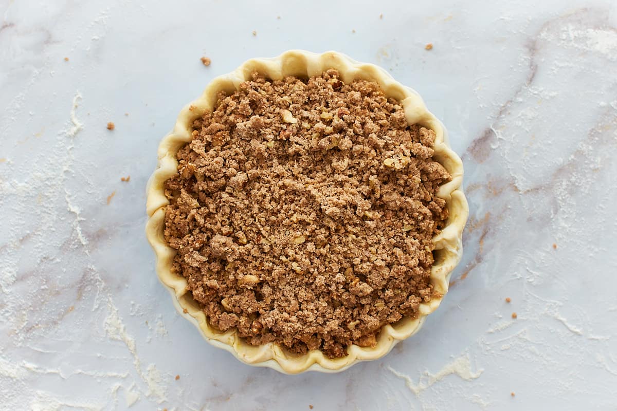 Assembled and unbaked pie in baking dish
