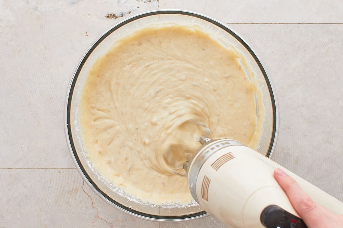 Mixing cake batter in a mixing bowl