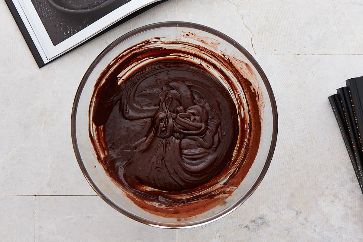 Whisked chocolate batter in a mixing bowl
