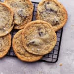 Vegan chocolate chip cookies on a cooling rack